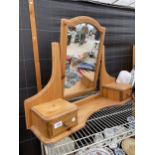 A DUCAL PINE DRESSING TABLE SWING MIRROR