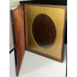 A VICTORIAN LEATHER PHOTOGRAPH FRAME IN THE STYLE OF A BOX