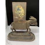 A VINTAGE BRYANT AND MAY MATCHBOX HOLDER IN THE FORM OF A DONKEY