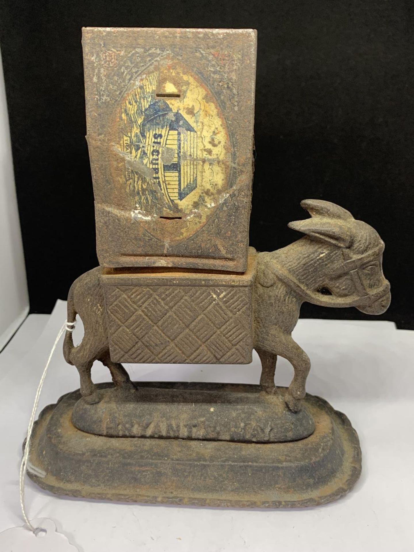 A VINTAGE BRYANT AND MAY MATCHBOX HOLDER IN THE FORM OF A DONKEY