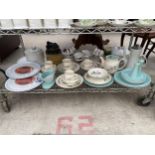 AN ASSORTMENT OF CERAMIC WARE TO INCLUDE PLATES, JUGS, AND TRIOS ETC