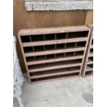 A SMALL 36 SECTION PIGEON GHOLE STORAGE UNIT