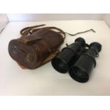 A PAIR OF EARLY 20TH CENTURY PILOTE BINOCULARS BY IRIS DE PARIS WITH LEATHER CASE