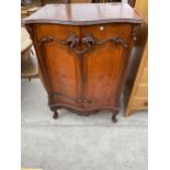 A VICTORIAN STYLE TWO DOOR STEREO CABINET WITH LIFT UP TOP 29" WIDE