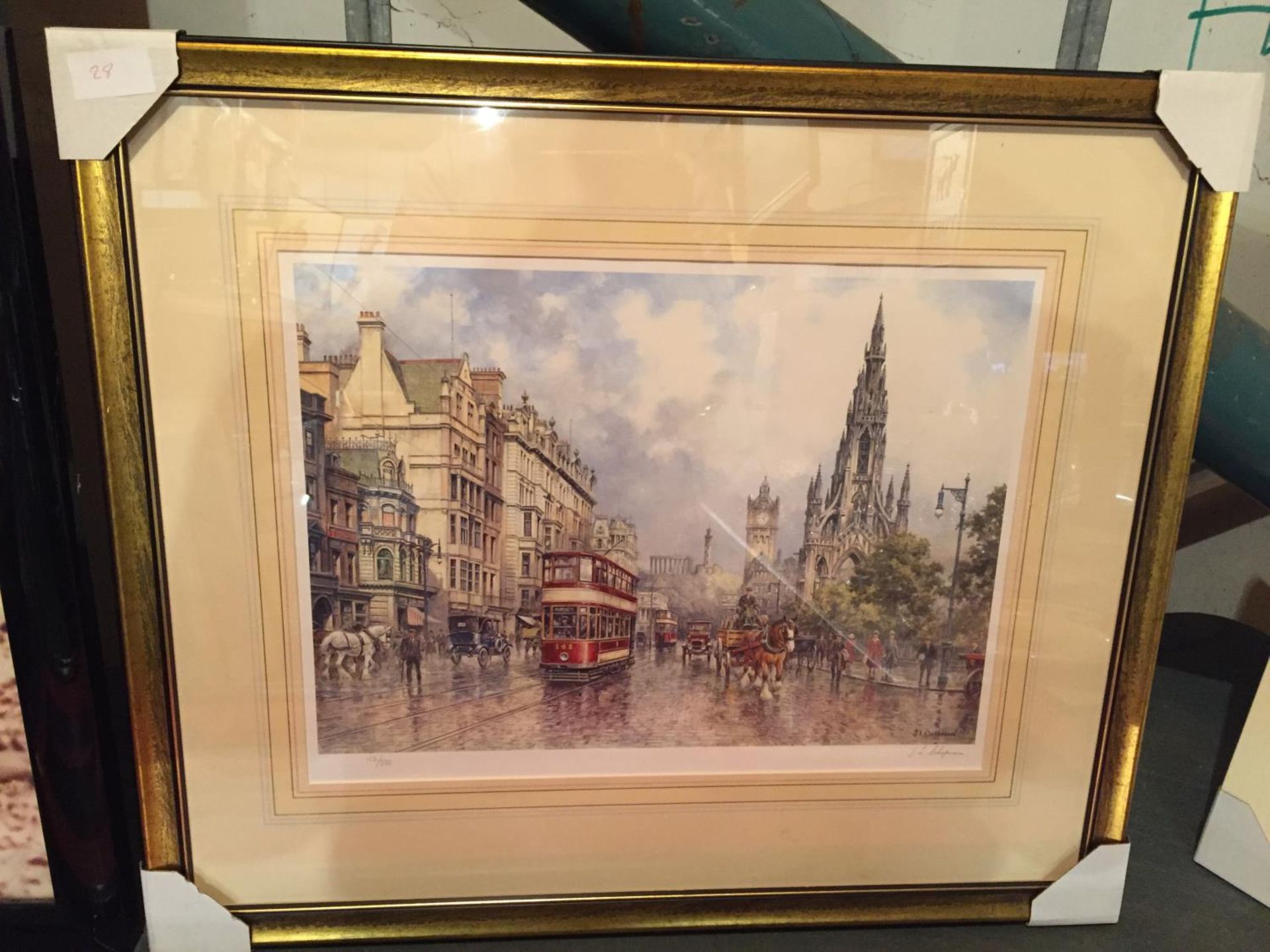 A FRAMED PRINT OF A VICTORIAN STREET SIGNED J L CHAPMAN LIMITED EDITION NUMBER 102/850