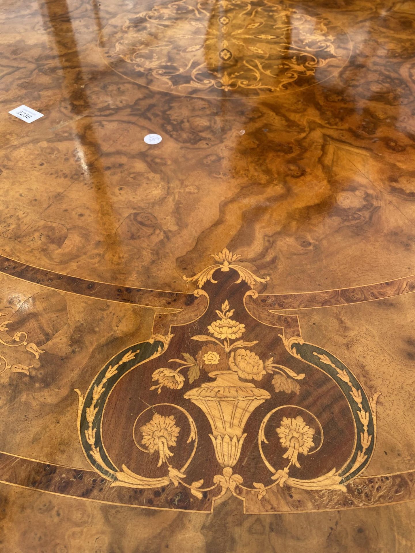 A VICTORIAN STYLE WALNUT AND INLAID LOO TYPE TABLE ON A QUARTETTO BASE 59" WIDE - Image 3 of 3