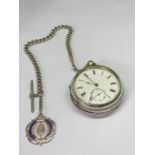 A HALLMARKED BIRMINGHAM SILVER POCKET WATCH WITH ALBERT CHAIN AND FOB