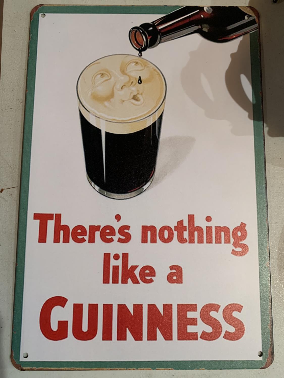 A GUINNESS METAL WALL HANGING SIGN - Image 2 of 2