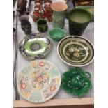 A SELECTION OF GREEN COLOURED CERAMICS AND GLASSWARE TO INCLUDE PLANTERS AND PLATES