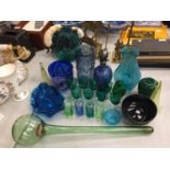 A COLLECTION OF COLOURED GLASS TO INCLUDE VASES, GLASSES AND ORNAMENTS