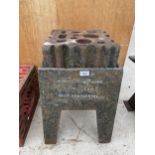 A LARGE VINTAGE SWAGE BLOCK WITH HEAVY CAST IRON STAND