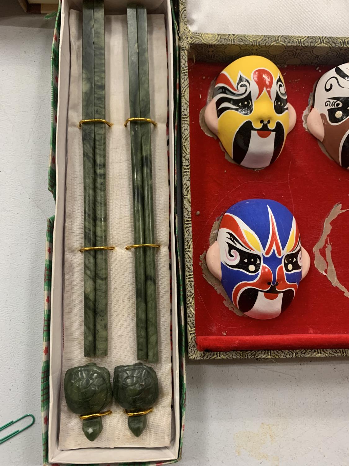 A COLLECTION OF ORIENTAL MASKS AND BOXED CHOPSTICKS ETC - Image 4 of 5