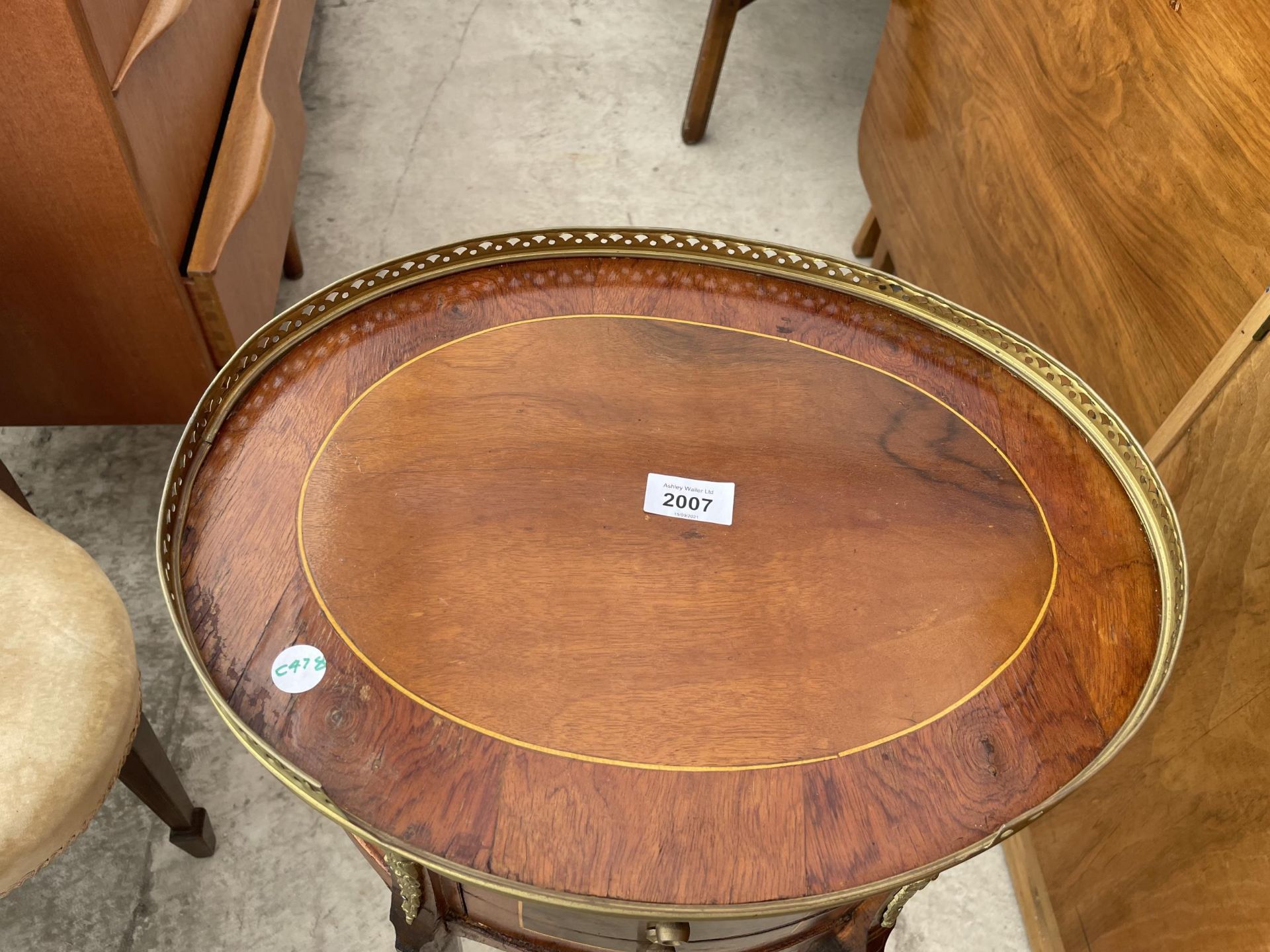 AN OVAL LOUIS XVI STYLE WALNUT SIDE TABLE WITH THREE SMALL DRAWERS, BRASS PIERCED GALLERY AND - Image 2 of 6