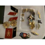 A LARGE COLLECTION OF BADGES TO INCLUDE MILITARIA