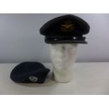A MID 20TH CENTURY RAF PEAKED CAP AND AN AIR TRAINING CORP BERET