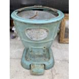 A VINTAGE CAST IRON THISTLE BOILER