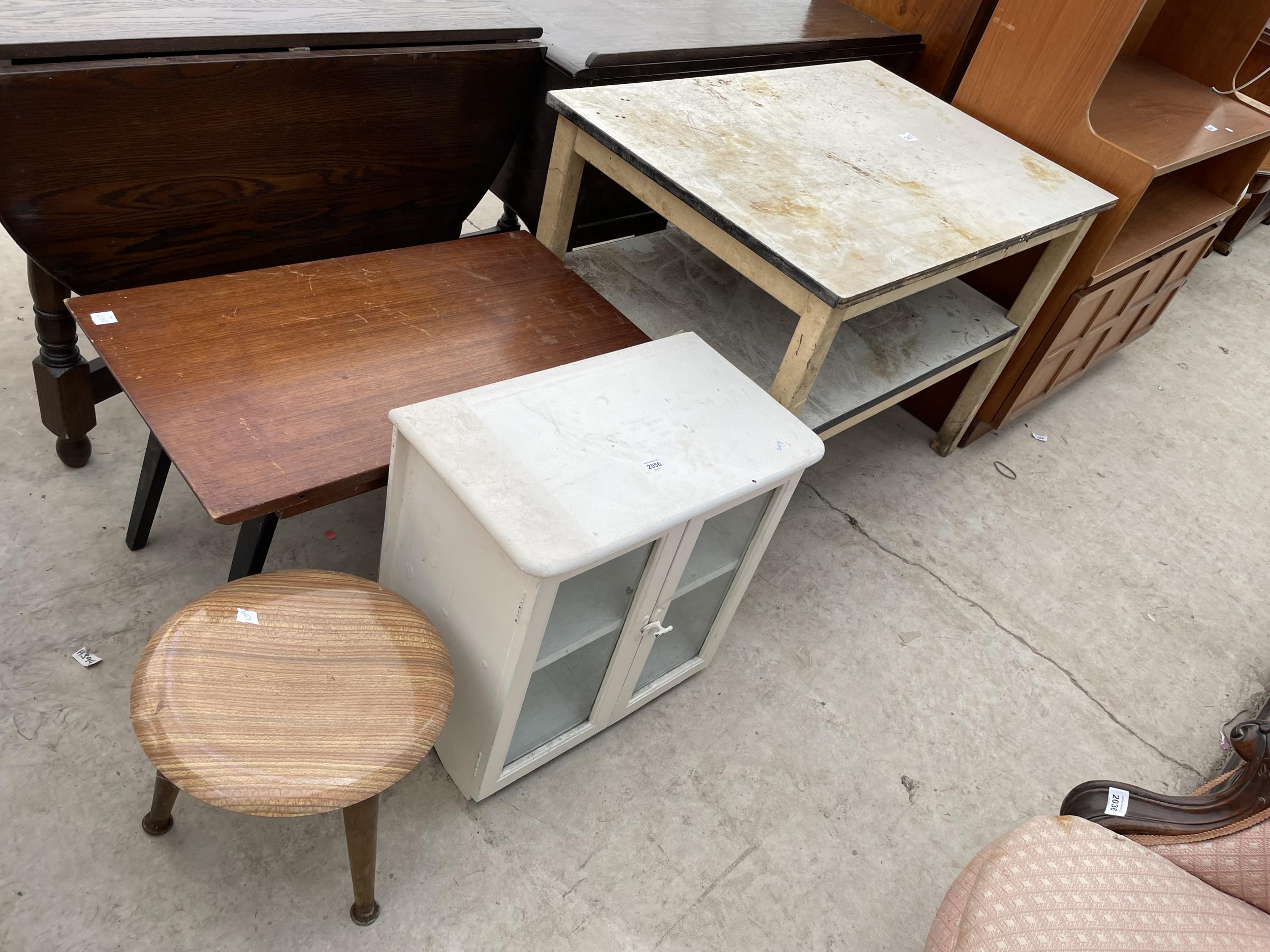 A TWO TIER 1950'S TABLE, TAK COFFEE TABLE, TWO DOOR GLAZED CABINET AND 1970'S STOOL