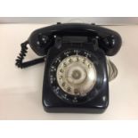 A VINTAGE BLACK TELEPHONE