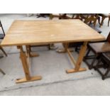 A PINE KITCHEN TABLE