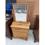 A MODERN PINE THREE DRAWER CHEST 22.5" WIDE AND A SWING FRAME MIRROR