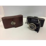 A VINTAGE CAMERA AND CASE