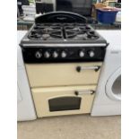 A CREAM AND BLACK LEISURE COOKER AND HOB