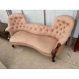 A VICTORIAN MAHOGANY BUTTON BACK, SPRUNG COUCH WITH SCROLL ARMS AND CABRIOLE LEGS