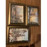 THREE FRAMED PRINTS OF CITY SCENES