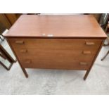 A RETRO TEAK WRIGHTON CHEST OF THREE DRAWERS 33" WIDE