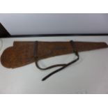 A LEATHER RIFLE SLIP WITH FLORAL DECORATION, LENGTH 103CDM