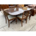 A MAHOGANY TWIN PEDESTAL DINING TABLE AND SIX DINING CHAIRS