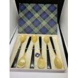 A SET OIN A PRESENTATION BOXF SIX SPOONS CRAFTED FROM HORN