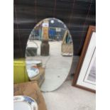 AN ART DECO STYLE BEVELED EDGE MIRROR