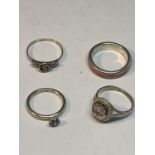 FOUR SILVER RINGS TO INCLUDE FLOWER DESIGNS