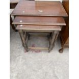 AN INLAID MAHOGANY NEST OF THREE TABLES