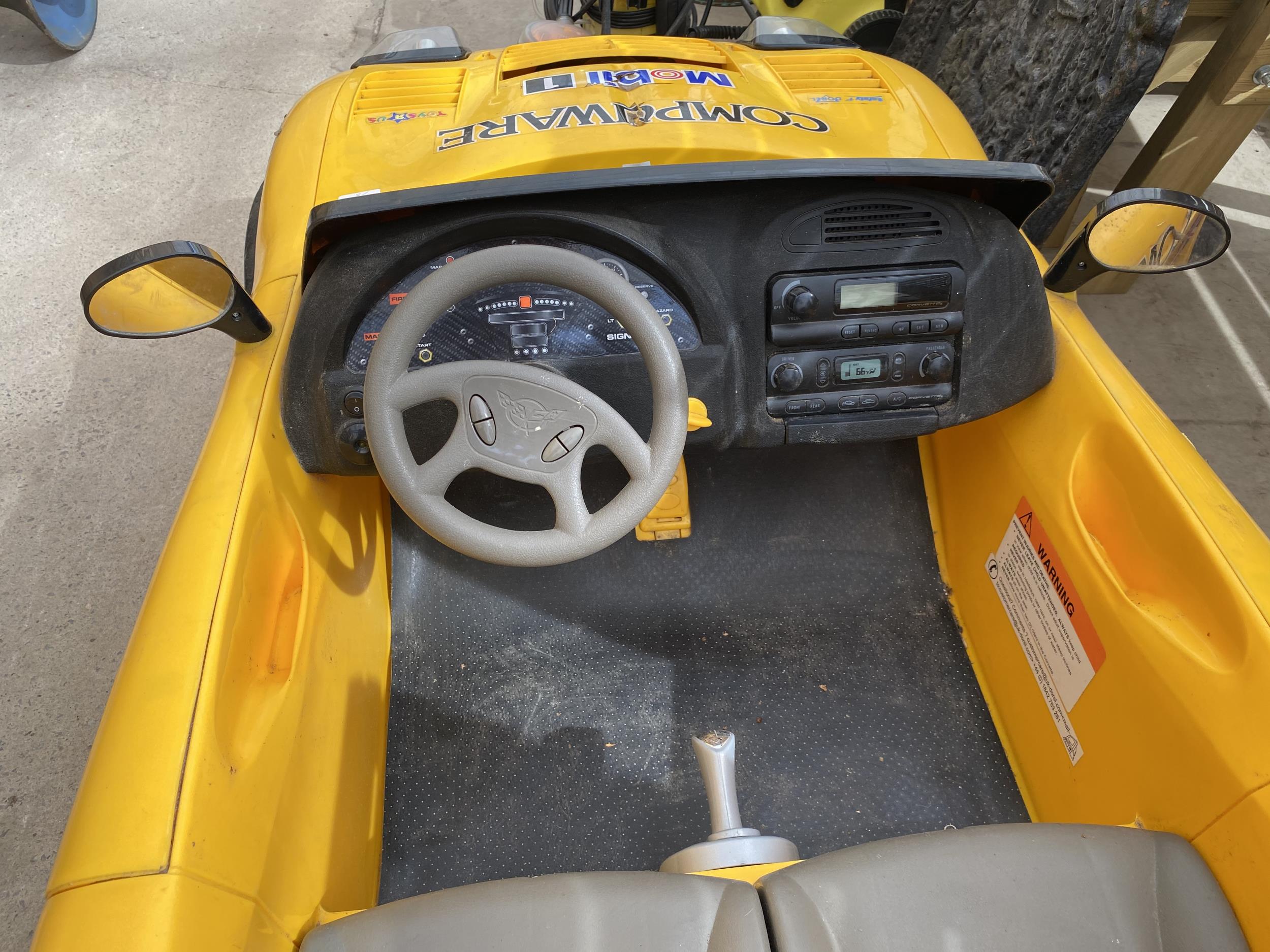 A CHILDRENS BATTERY POWERED RIDE ON CORVETTE CAR WITH CHARGER - Image 2 of 4