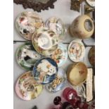 A COLLECTION OF ROYAL WORCESTER PLATES BY PAM COOPER FROM THE MIXED COMPANY PLATE COLLECTION