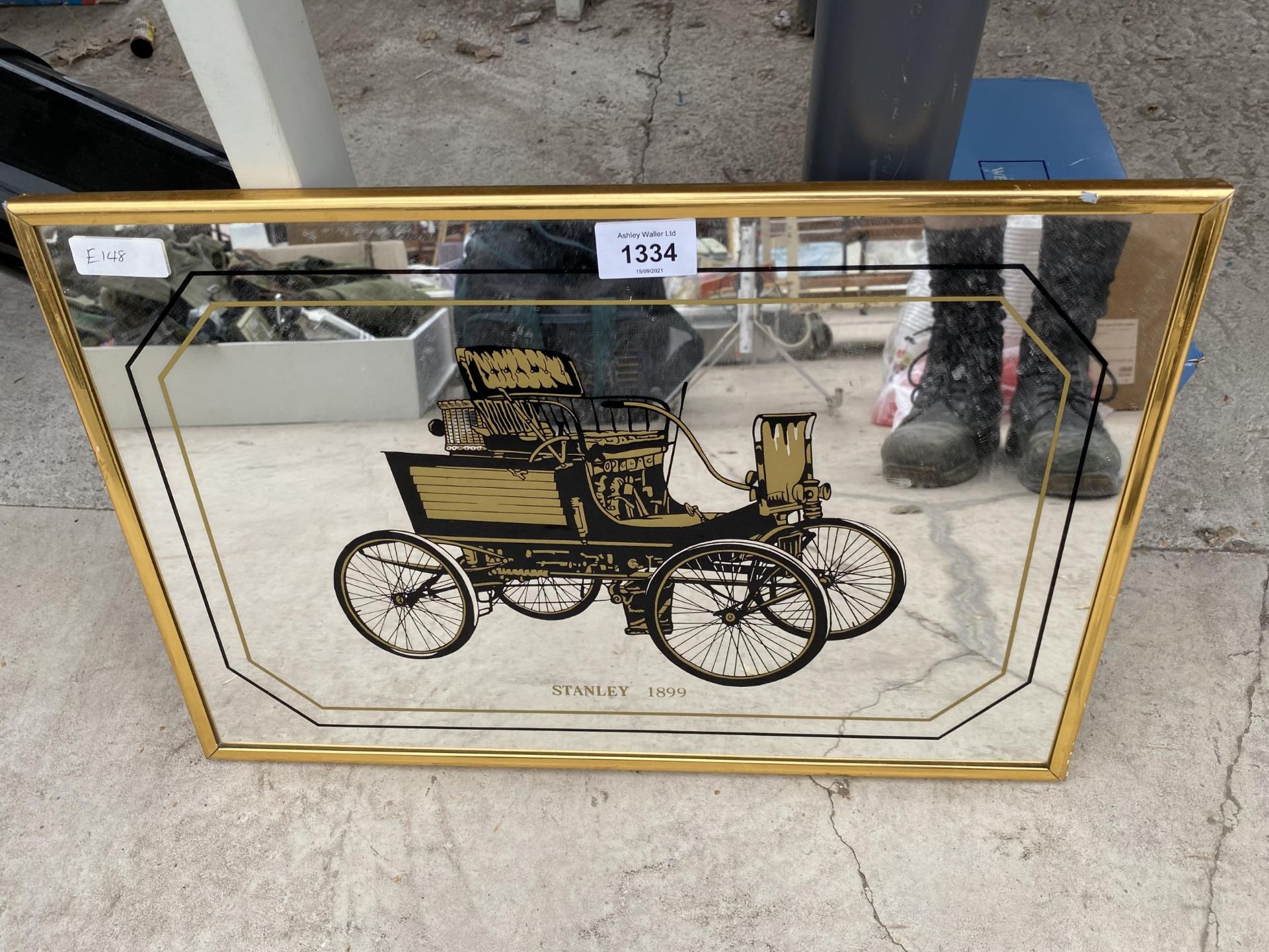 A STANLEY 1899 ADVERTISING MIRROR