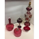 A COLLECTION OF CRANBERRY COLOURED GLASS TO INCLUDE A LAMP BASE HEIGHT 44CM