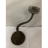 A VINTAGE COPPER AND CAST IRON CANDLE SICK HOLDER