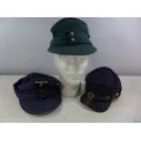 TWO GERMAN MILITARY CAPS, ONE WITH EAGLE & SWASTIKA BADGE AND A U.S. CAP (3)