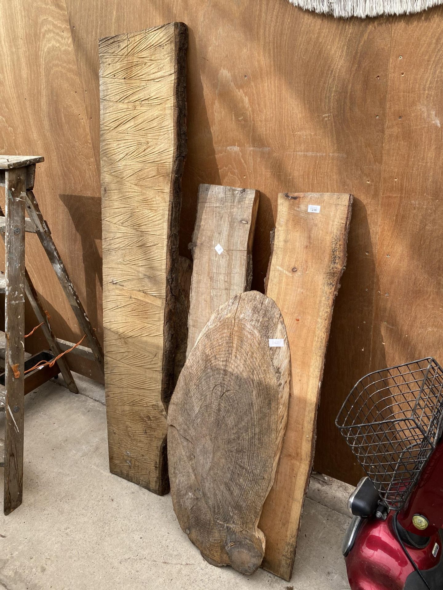 AN ASSORTMENT OF VARIOUS SHAPE AND SIZE PIECES OF ROUGH SAWN TIMBER