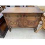 AN EARLY 20TH CENTURY OAK SIDEBOARD 48" WIDE