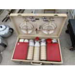 A RETRO PICNIC HAMPER WITH PLATES, FLATWARE AND CUPS ETC