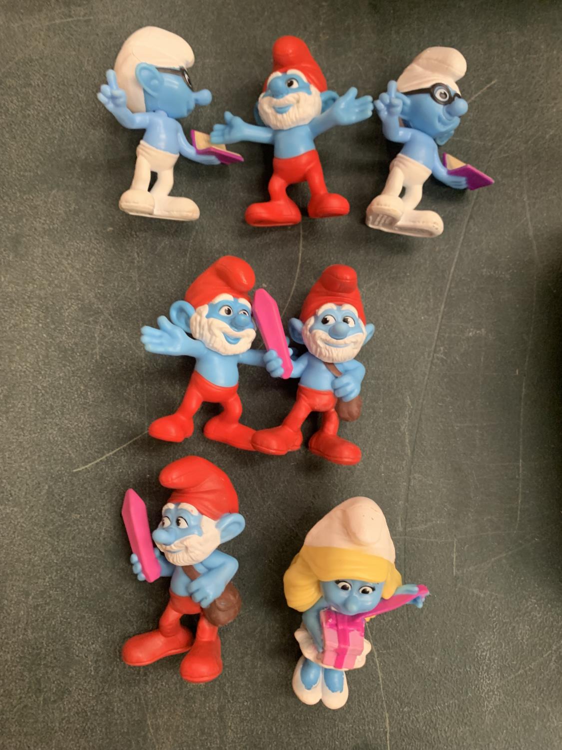 SEVEN VARIOUS COLLECTABLE SMURF FIGURES