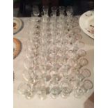 A LARGE NUMBER OF SHERRY GLASSES AND A NUMBER OF PORT GLASSES