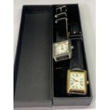 TWO WRISTWATCHES WITH BLACK LEATHER STRAPS
