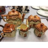 AN AFTERNOON TEA SET OF COUNTRY THATCHED COTTAGE WARE TO INCLUDE A TEA POT, LIDDED BUTTER DISH,