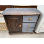 A MODERN PAINTED PINE CUPBOARD ENCLOSING THREE DRAWERS, 36" WIDE