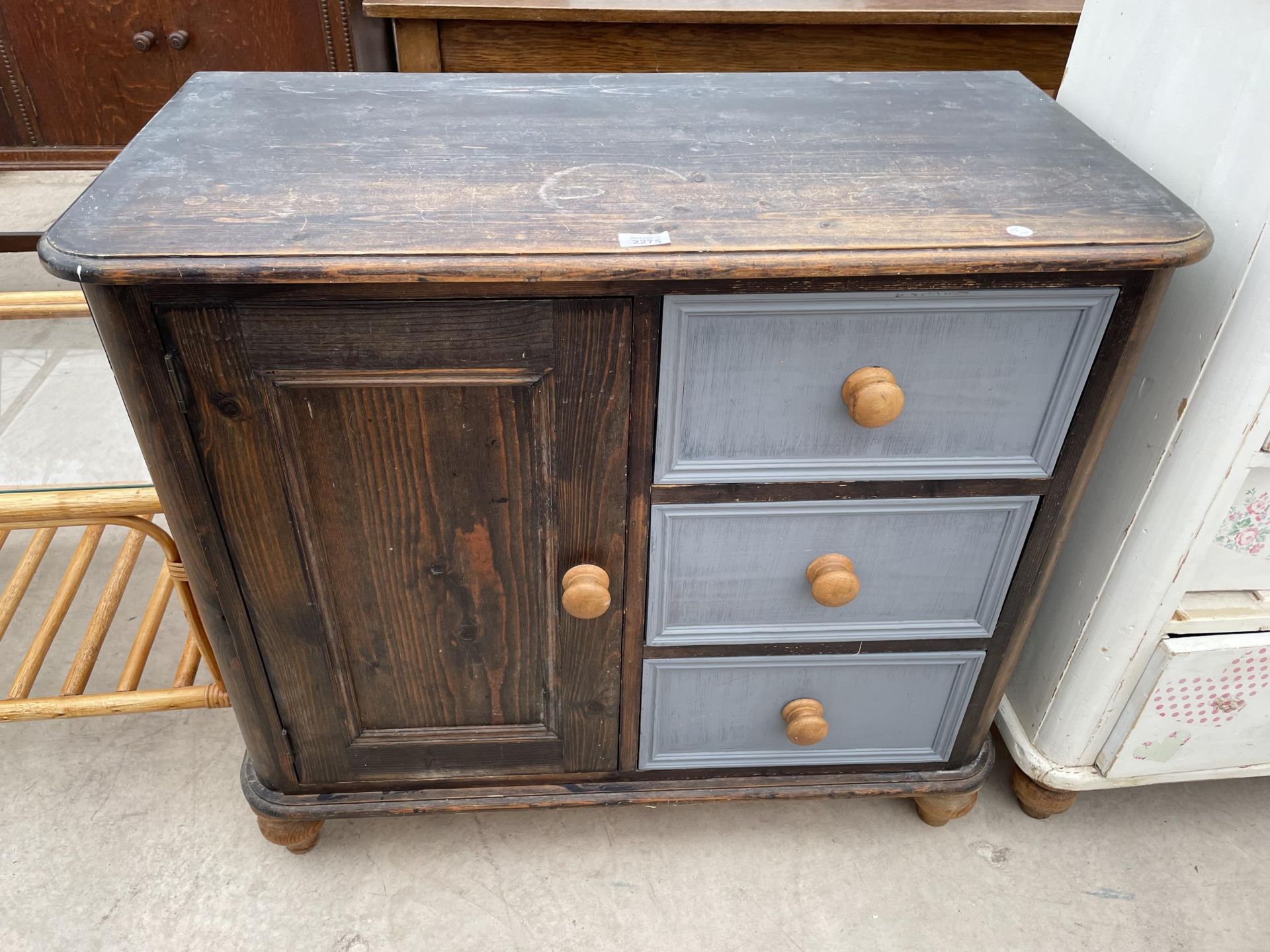 A MODERN PAINTED PINE CUPBOARD ENCLOSING THREE DRAWERS, 36" WIDE